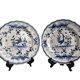 Moustiers, pairs of plates with wading bird design, scalloped edge, early 20th century.
