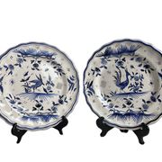 Moustiers, pairs of plates with wading bird design, scalloped edge, early 20th century.