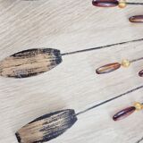 Vintage metal sun mirror in the style of Line Vautrin