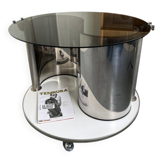 Vintage metal and smoked glass coffee table on casters bar