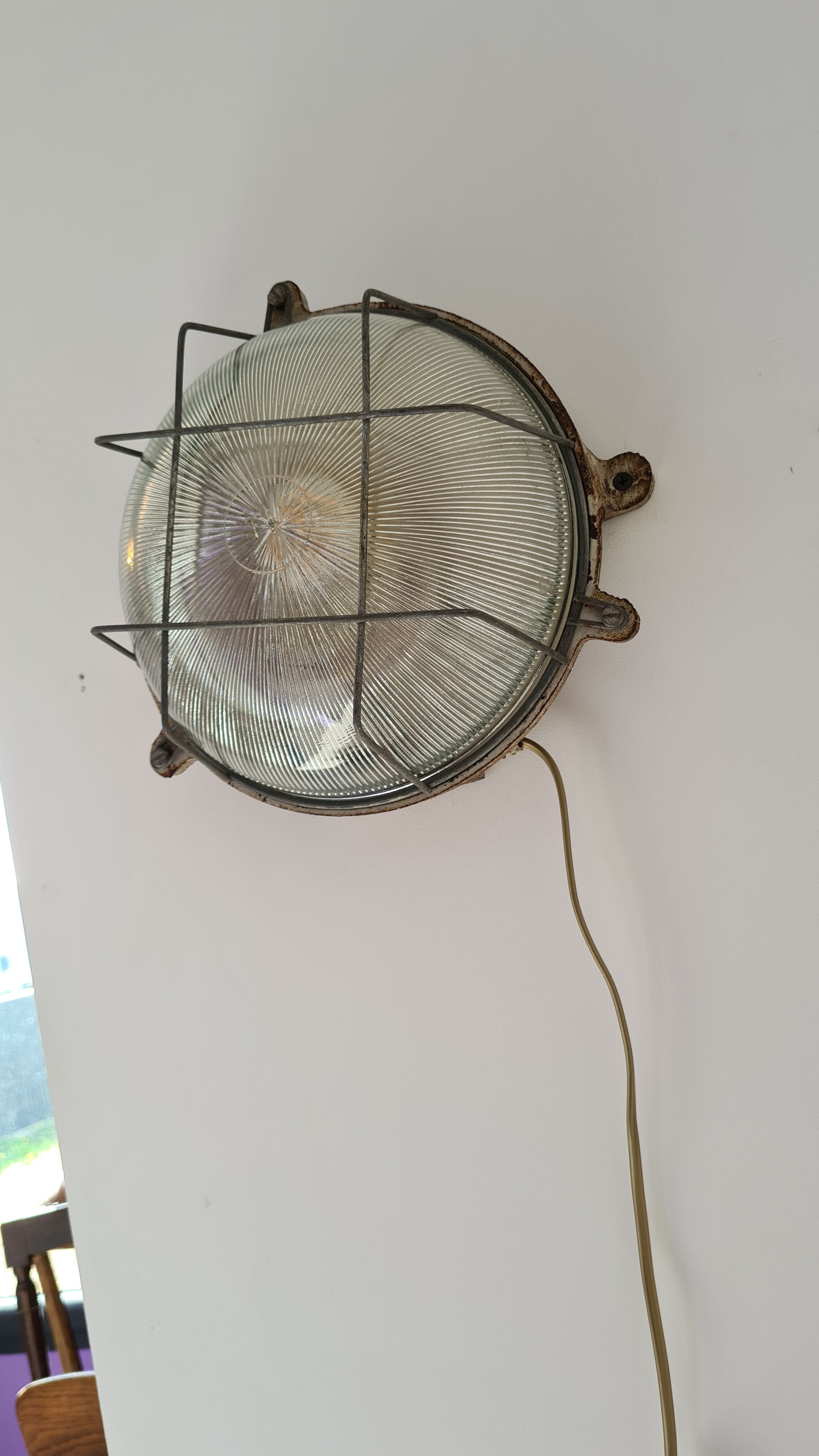 Cast iron porthole wall lamp by TH