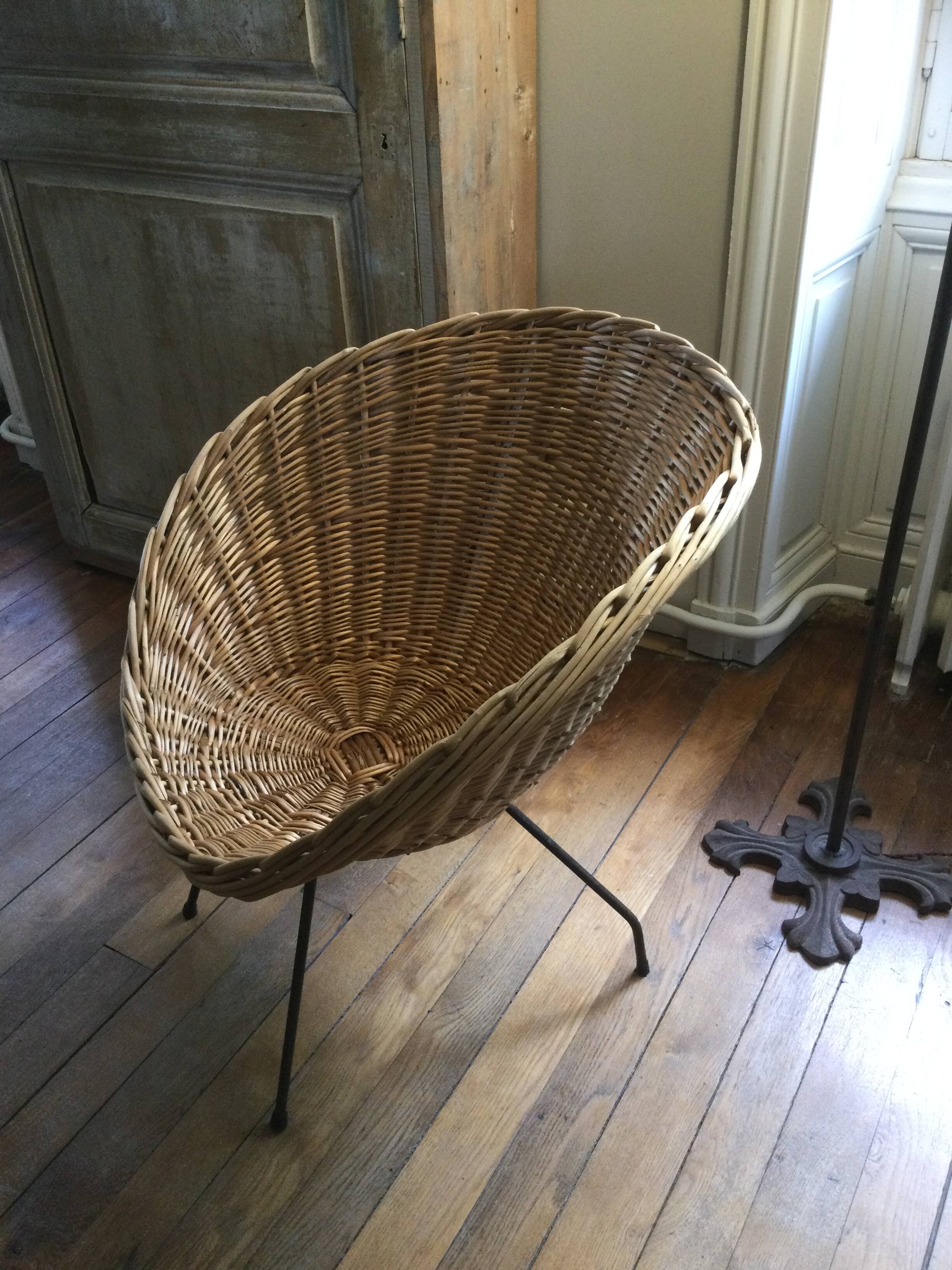Antique round rattan armchair