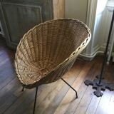 Antique round rattan armchair