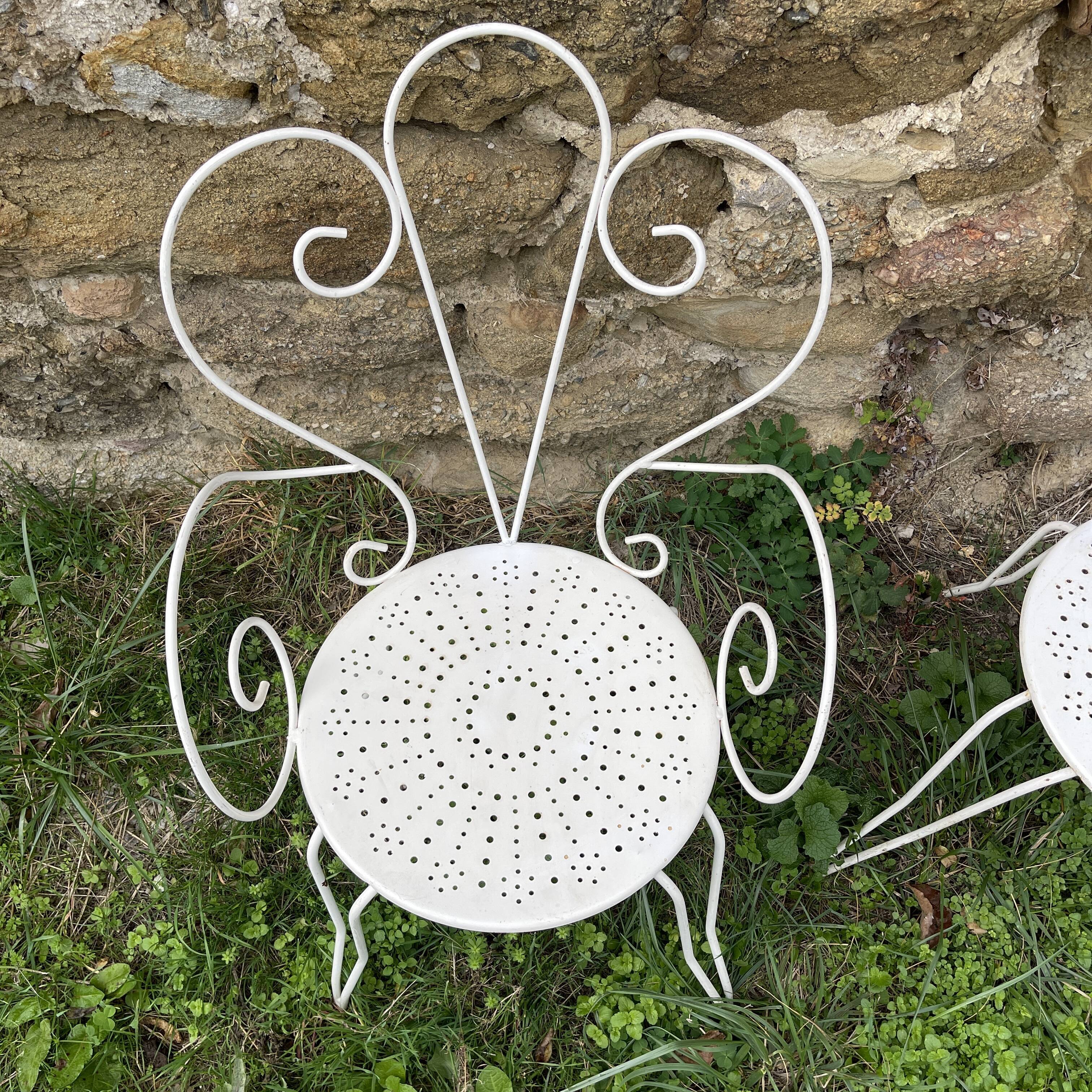 Armchair and garden chair in wrought iron