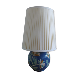 Ancient ceramic ball lamp and draped day offal