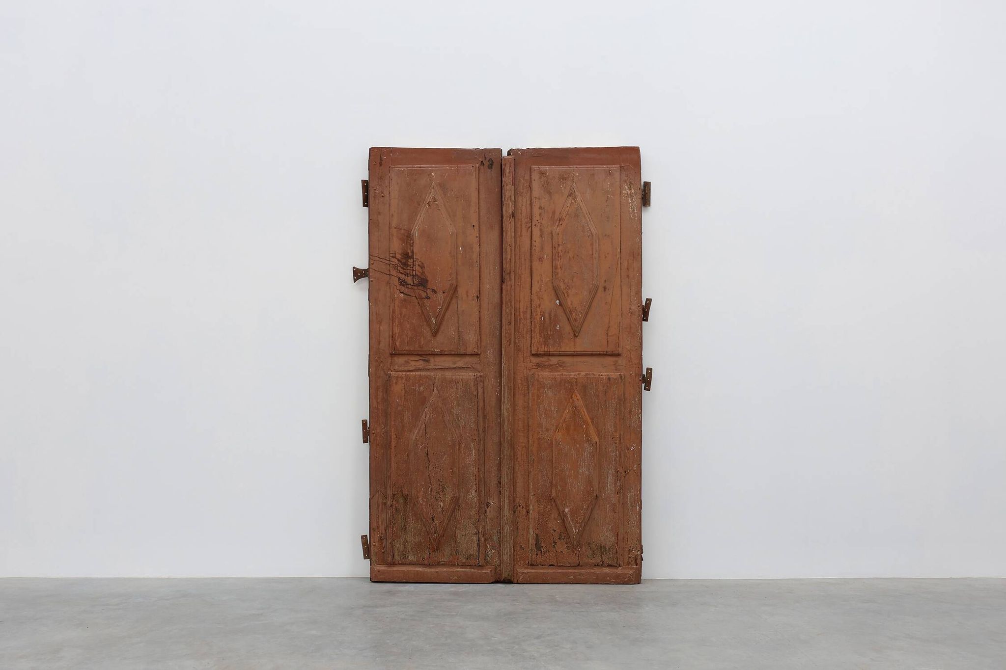 Large 17th century Monastery doors in terracotta lacquered oak, Portugal
