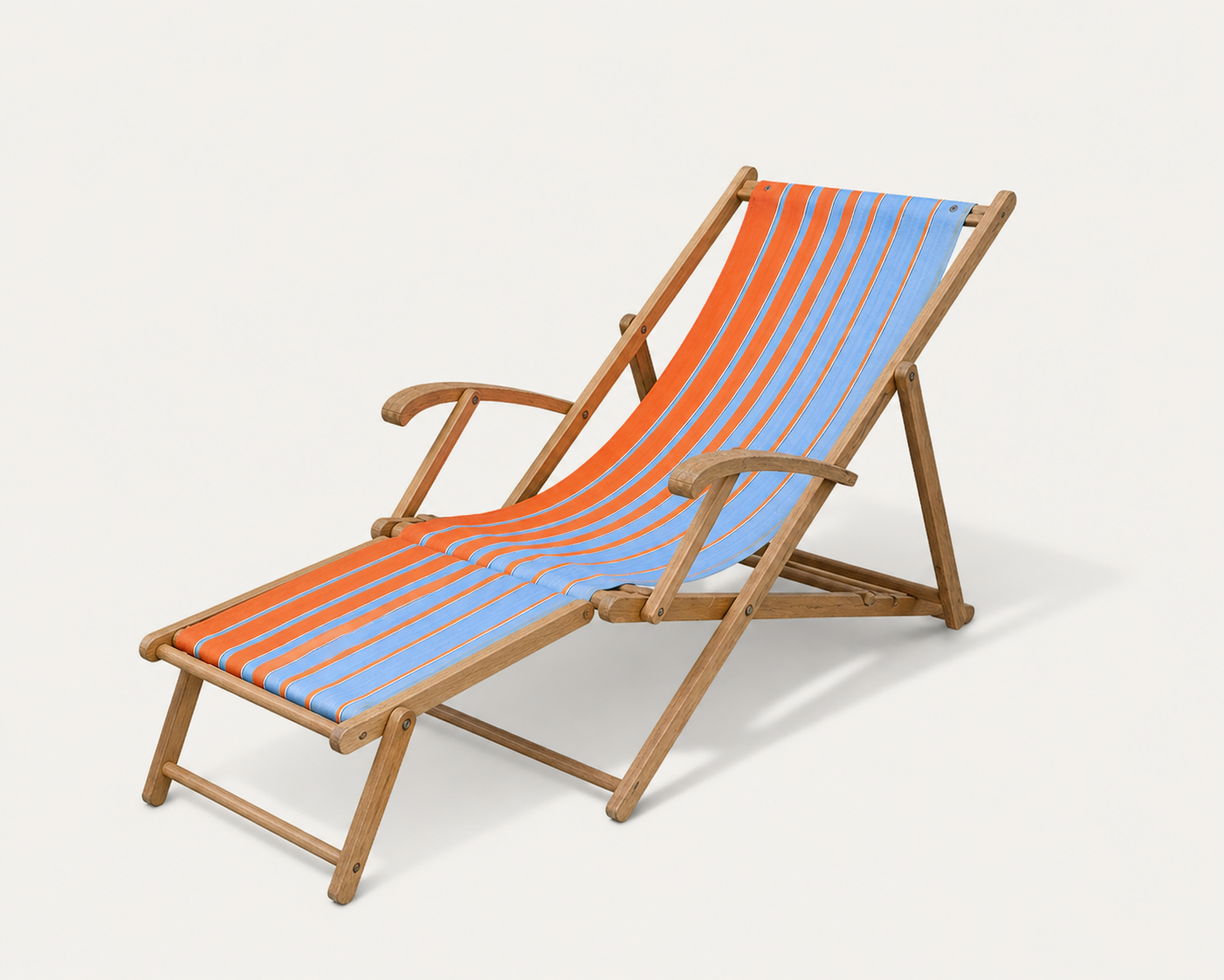 Vintage deck chair with orange and blue striped fabric, original patina.