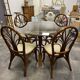 4 vintage woven rattan chairs