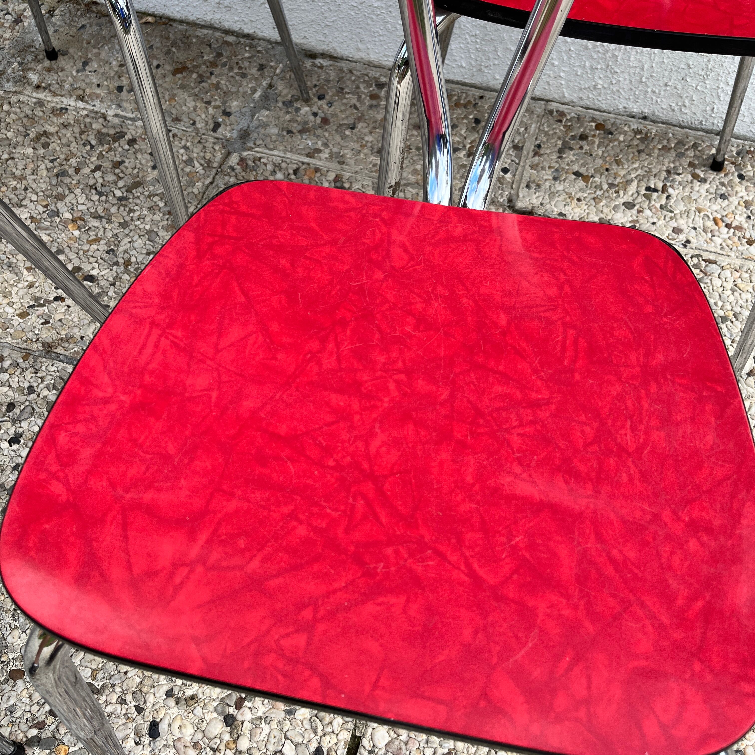 Chairs in formica red foot compass