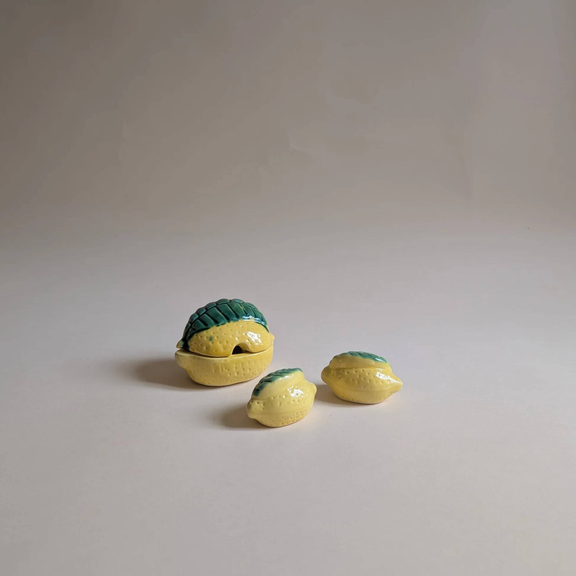 Lemon slushie set, gravy boat, pepper shaker and salt shaker