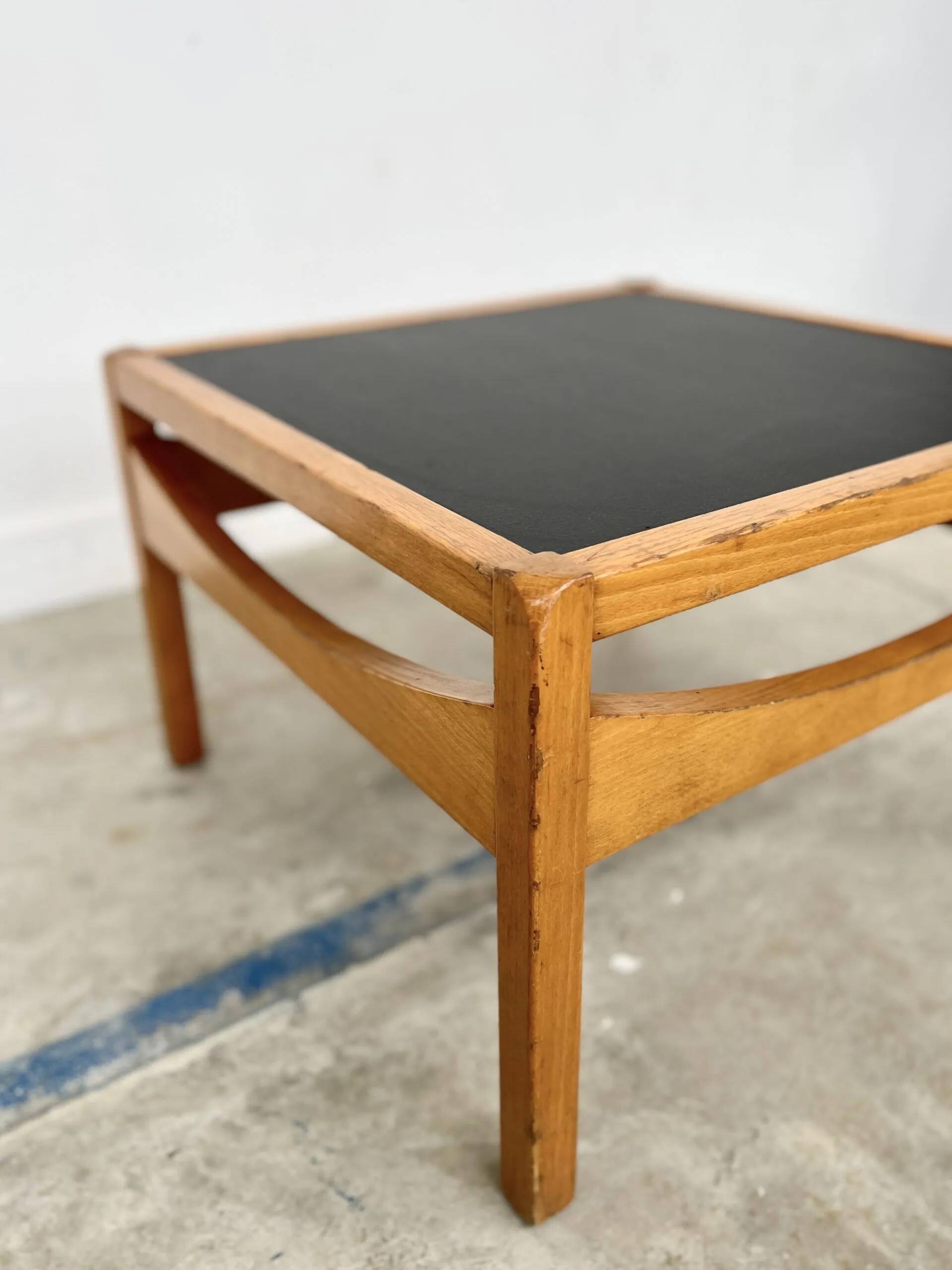 Baumann coffee table with black medium-density top