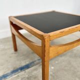 Baumann coffee table with black medium-density top