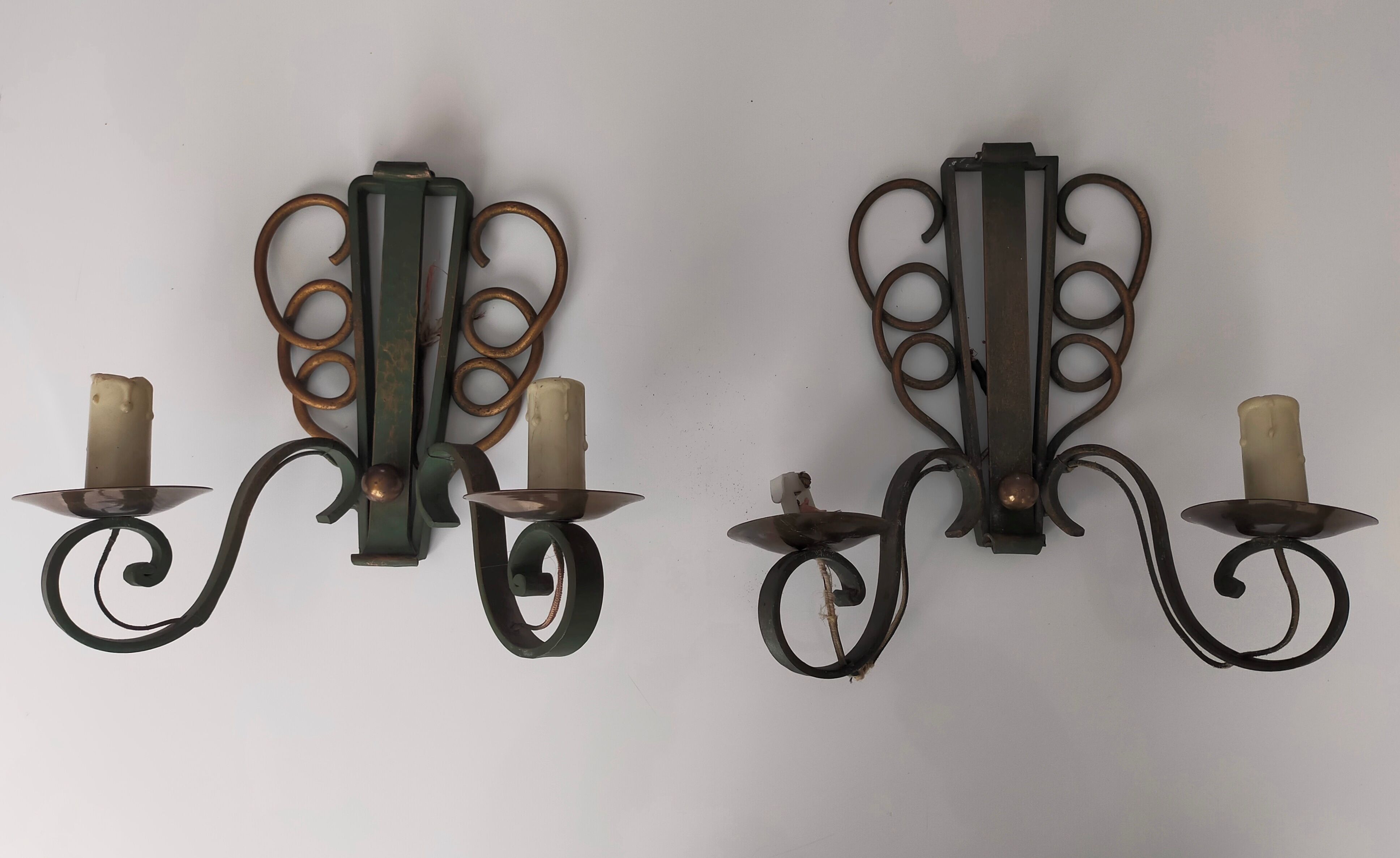 Pairs of vintage wrought iron wall lamps