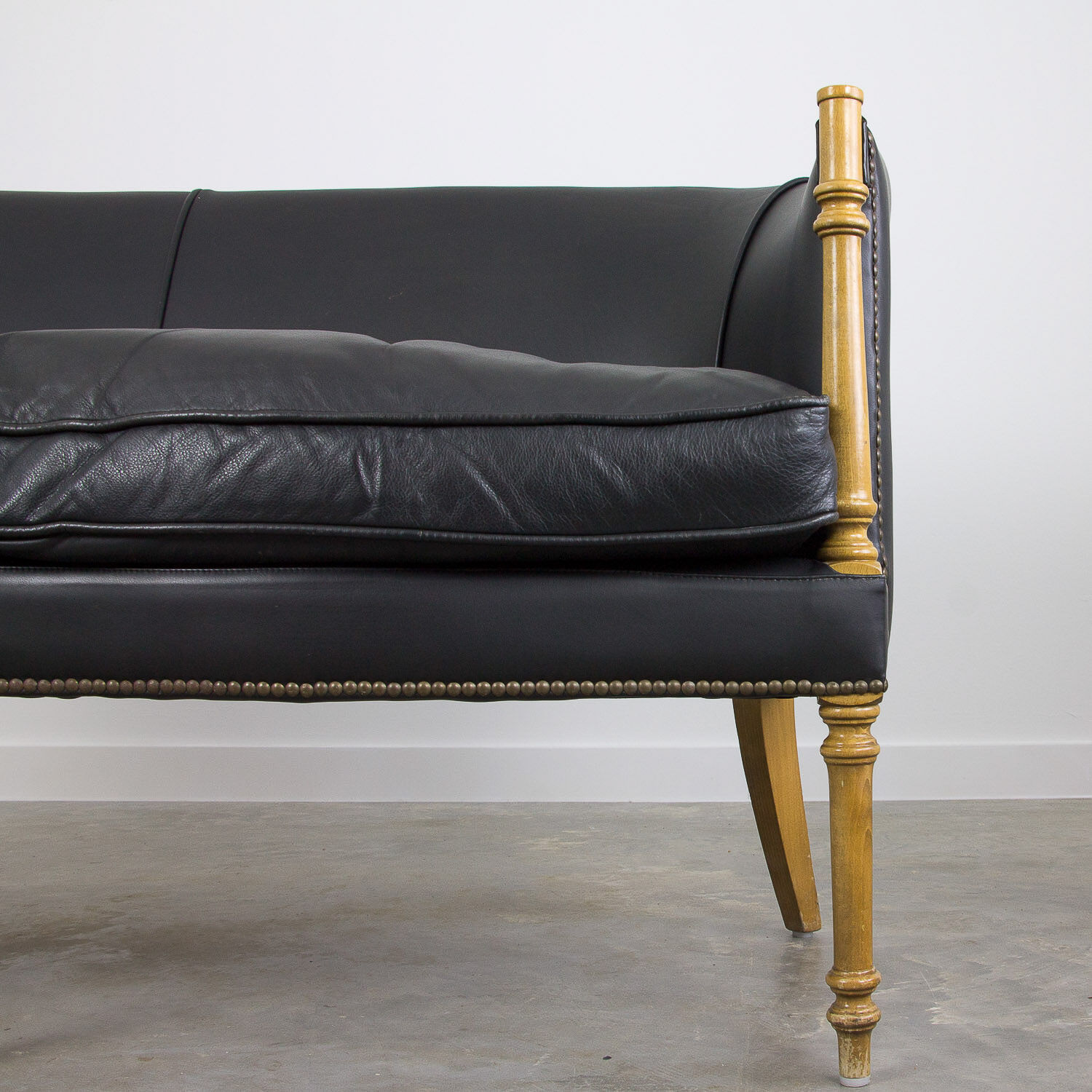 Black leather club sofa