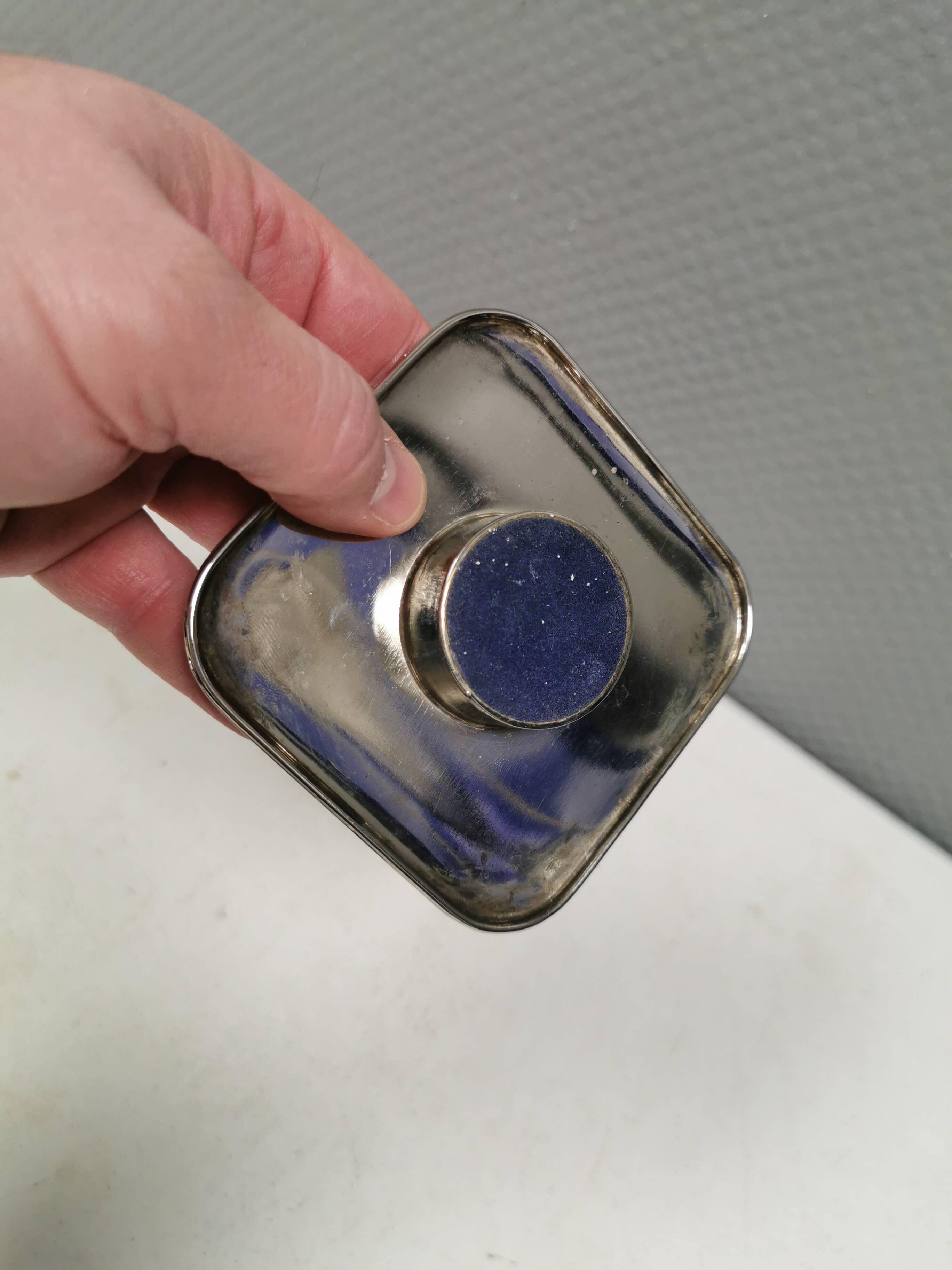 A set of classic Danish candlesticks in polished metal.