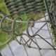 Corner shelf/plant stand in wrought iron and rattan