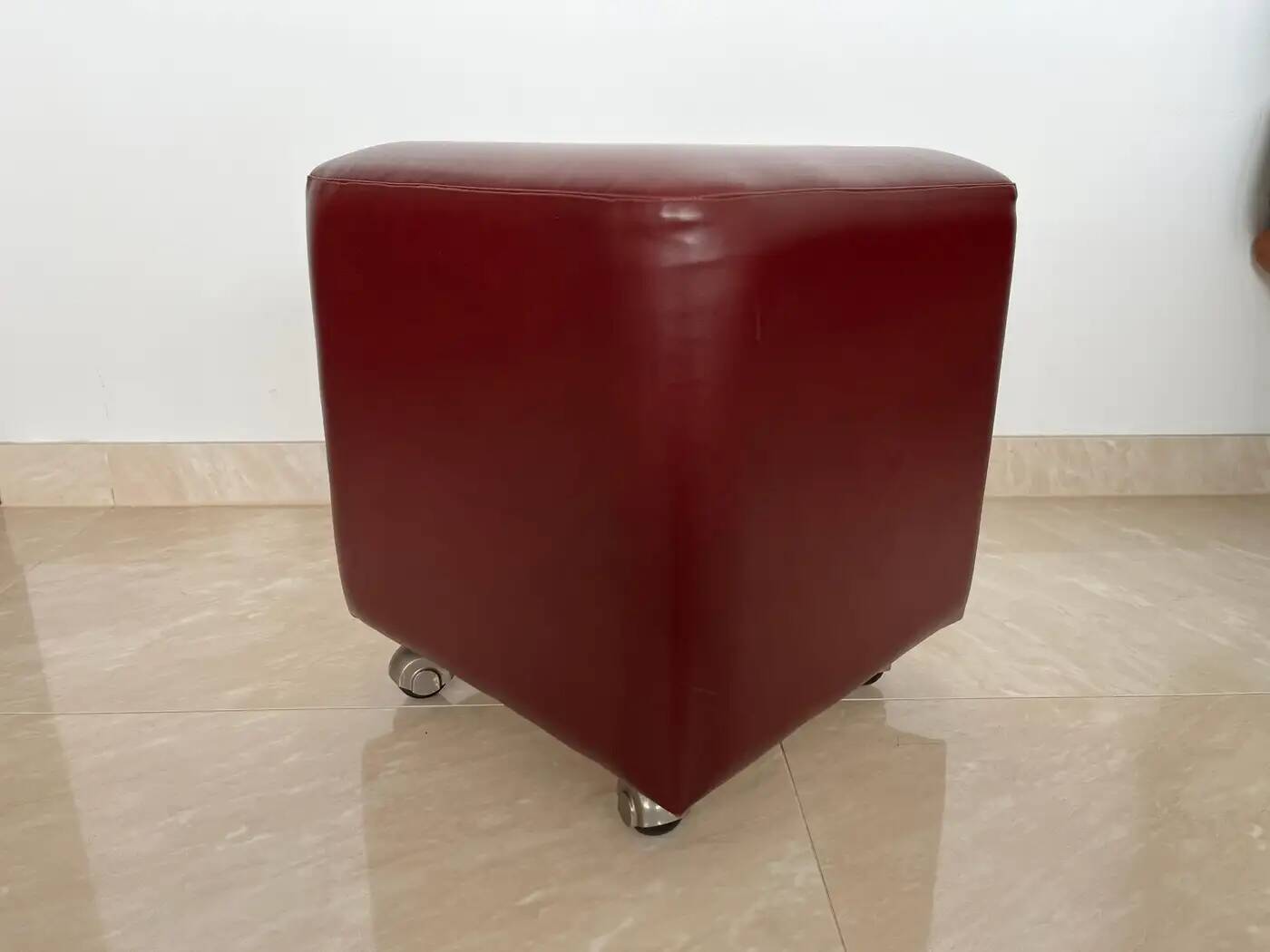 Pair of midcentury design wheel stools or tabourets, artificial leather, 1970s