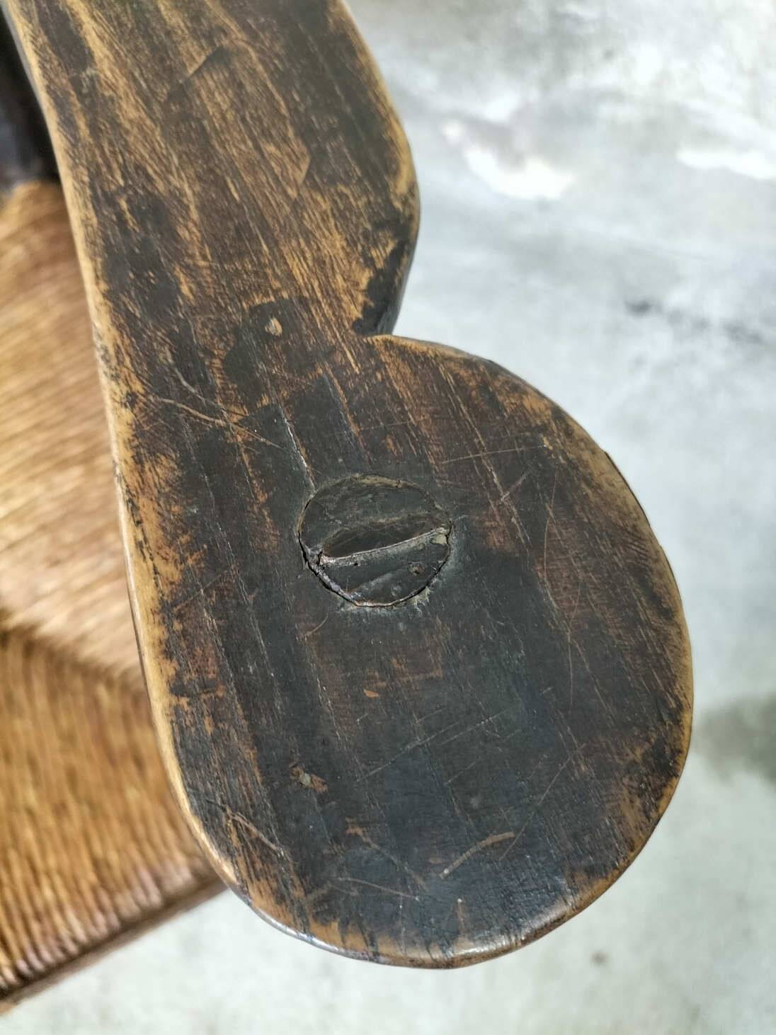 High back straw armchair