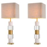 Pair of table lamps in patinated brass, white marble and crystal.