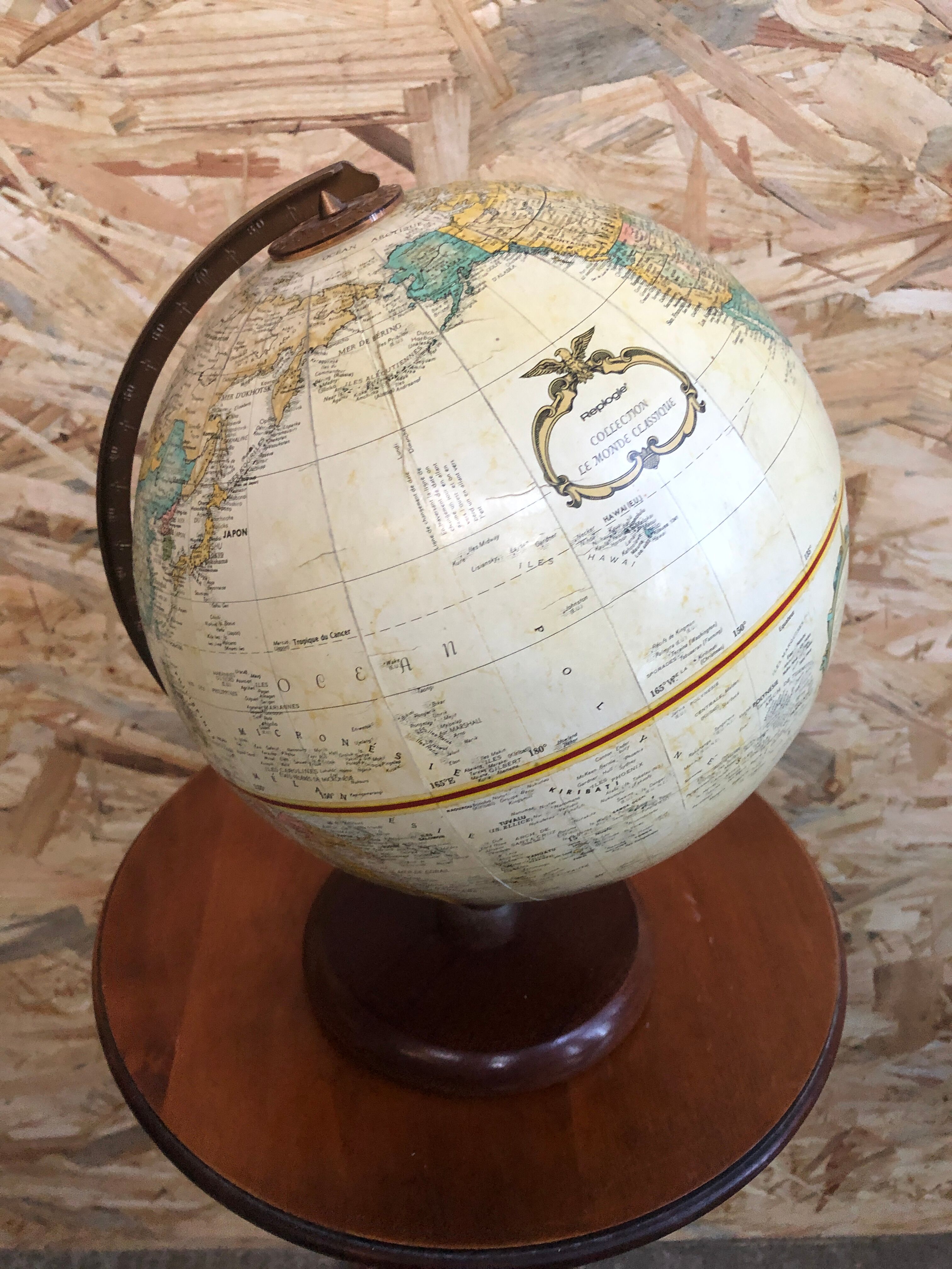Old globe world map with arch + vintage wood base