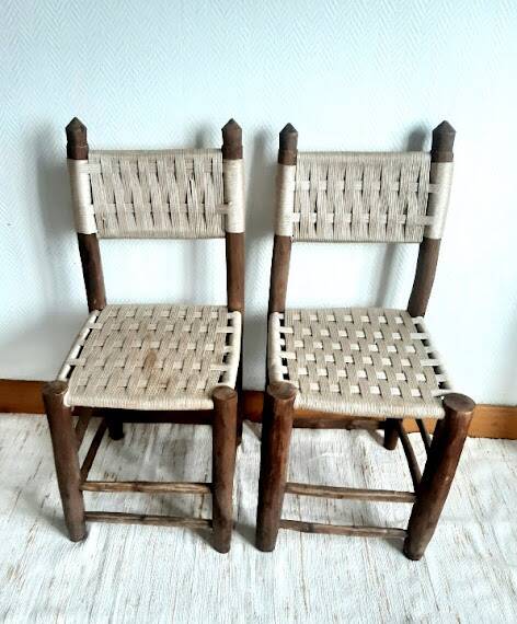 Brutalist wooden and rope chairs