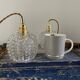Set of two vintage electric chiseled glass handhelds