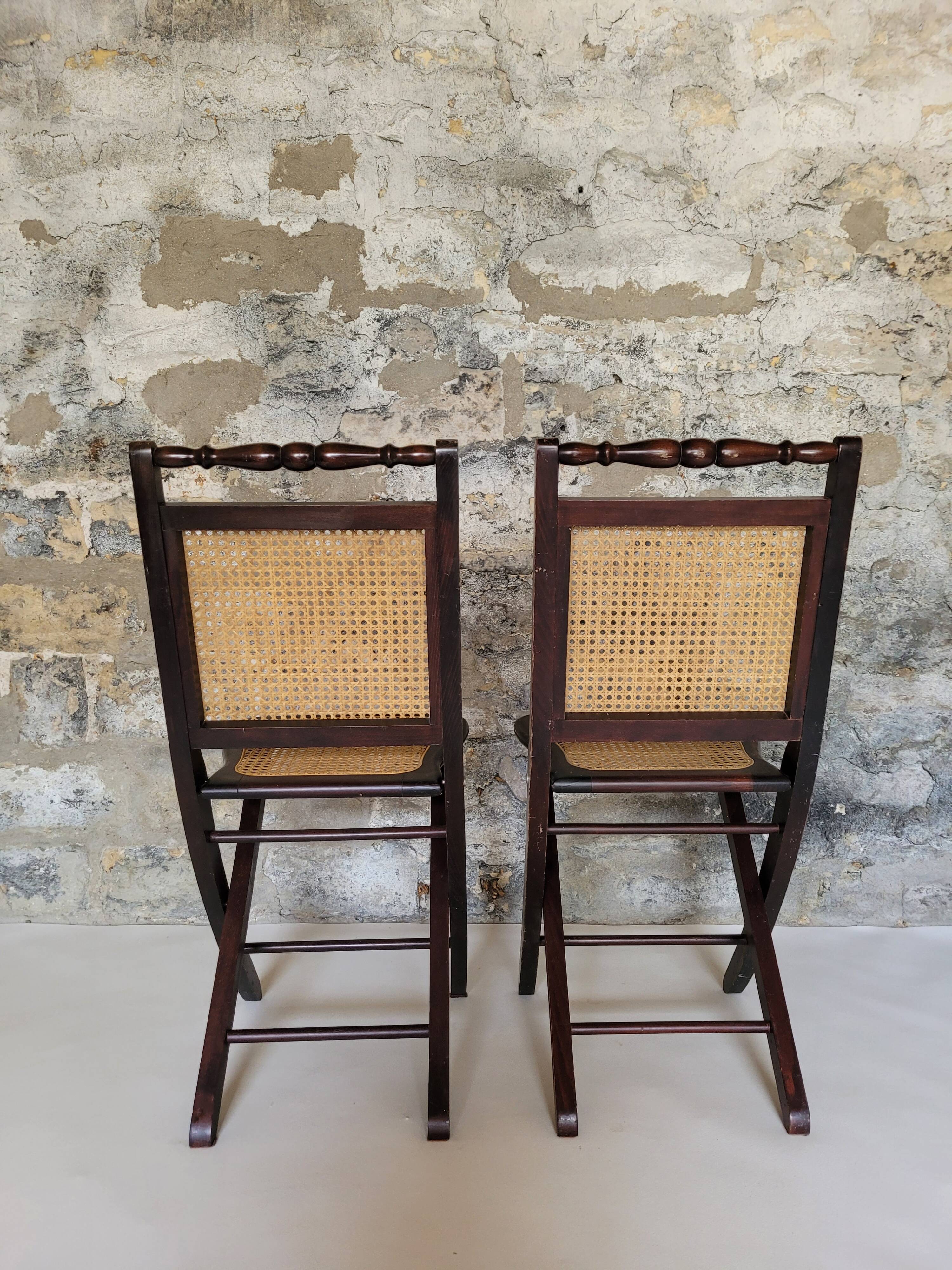 Pair of folding cane chairs