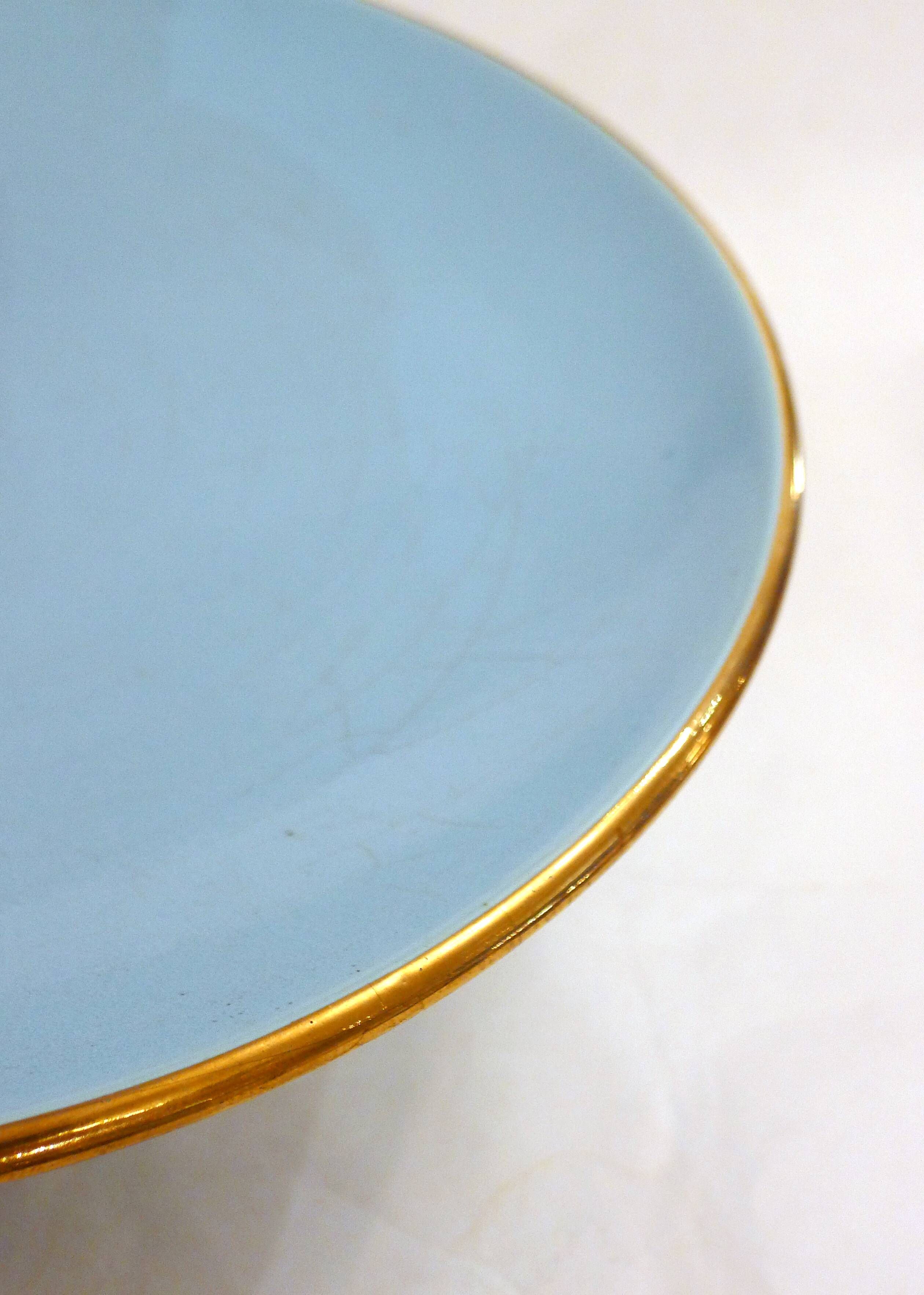 Art Deco modernist coupe, with a base of 3 spheres, in turquoise ceramic and gilding.