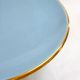 Art Deco modernist coupe, with a base of 3 spheres, in turquoise ceramic and gilding.