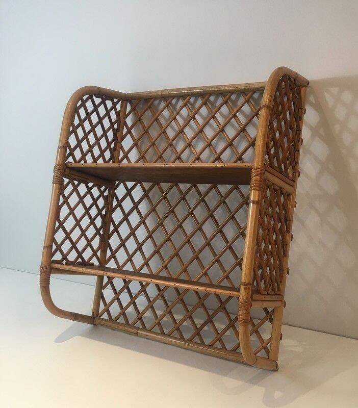 Rattan wall shelf. Attributed to Audoux-Minet
