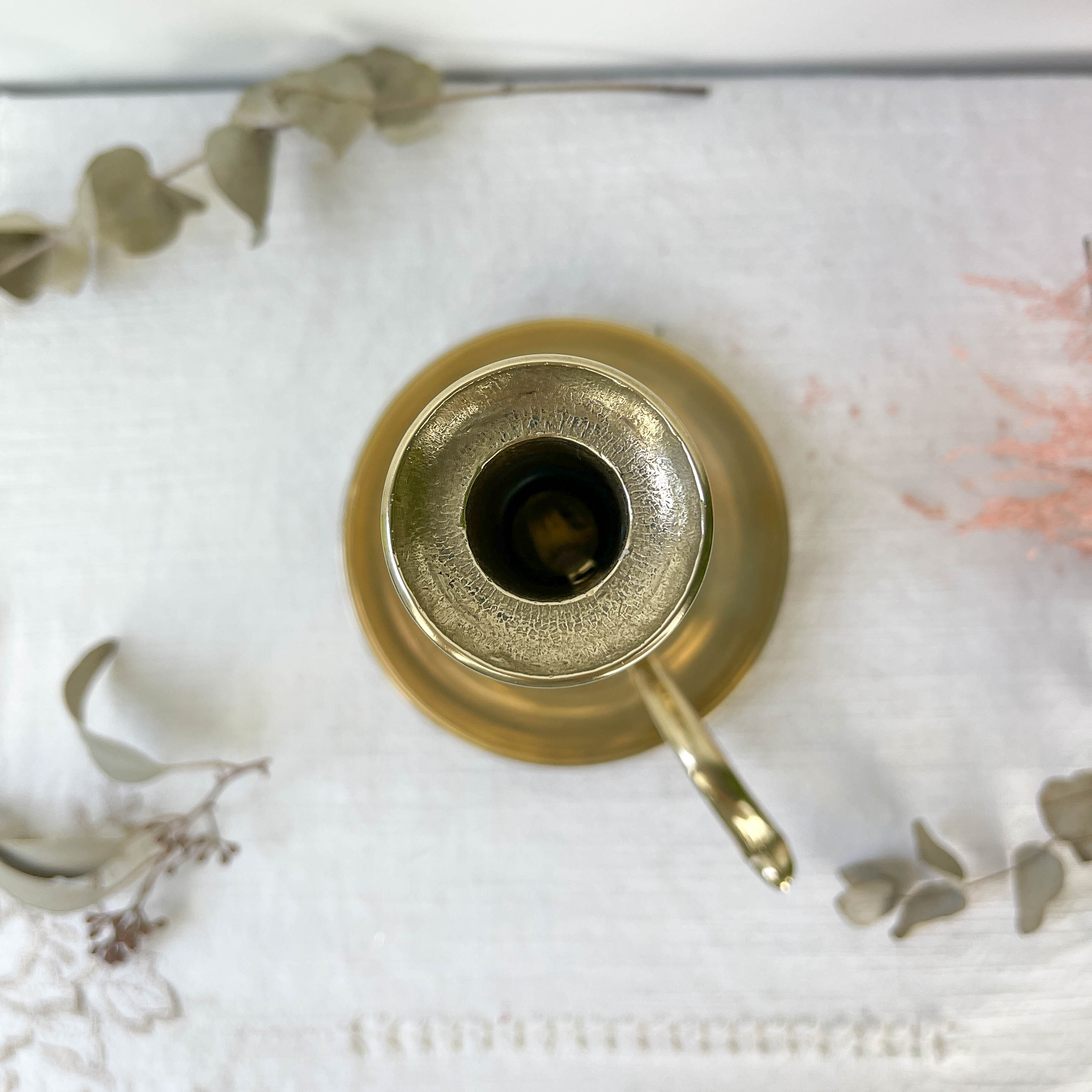 Brass candle holder with pusher late nineteenth century