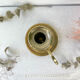 Brass candle holder with pusher late nineteenth century