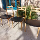 5 Scandinavian style chairs, wood and black faux leather.