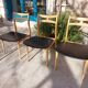 5 Scandinavian style chairs, wood and black faux leather.