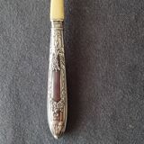 silver-plated baby feeding spoon