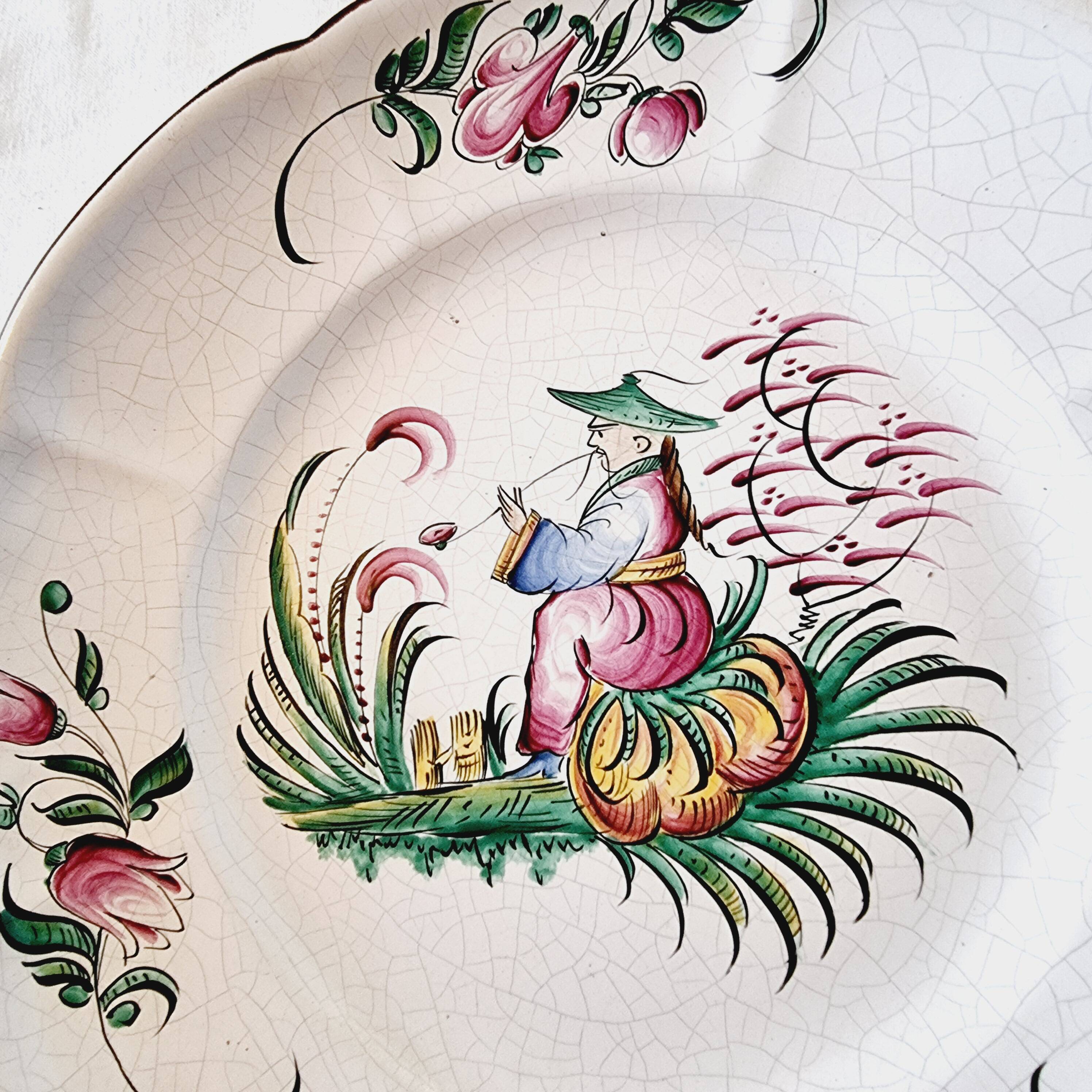 Antique ceramic or earthenware plate from the 19th century, Chinese style decoration