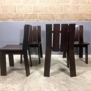 Brutalist and modernist dining chairs from the 1970s in architectural brown wood.