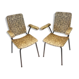 2 small black and white armchairs
