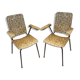 2 small black and white armchairs