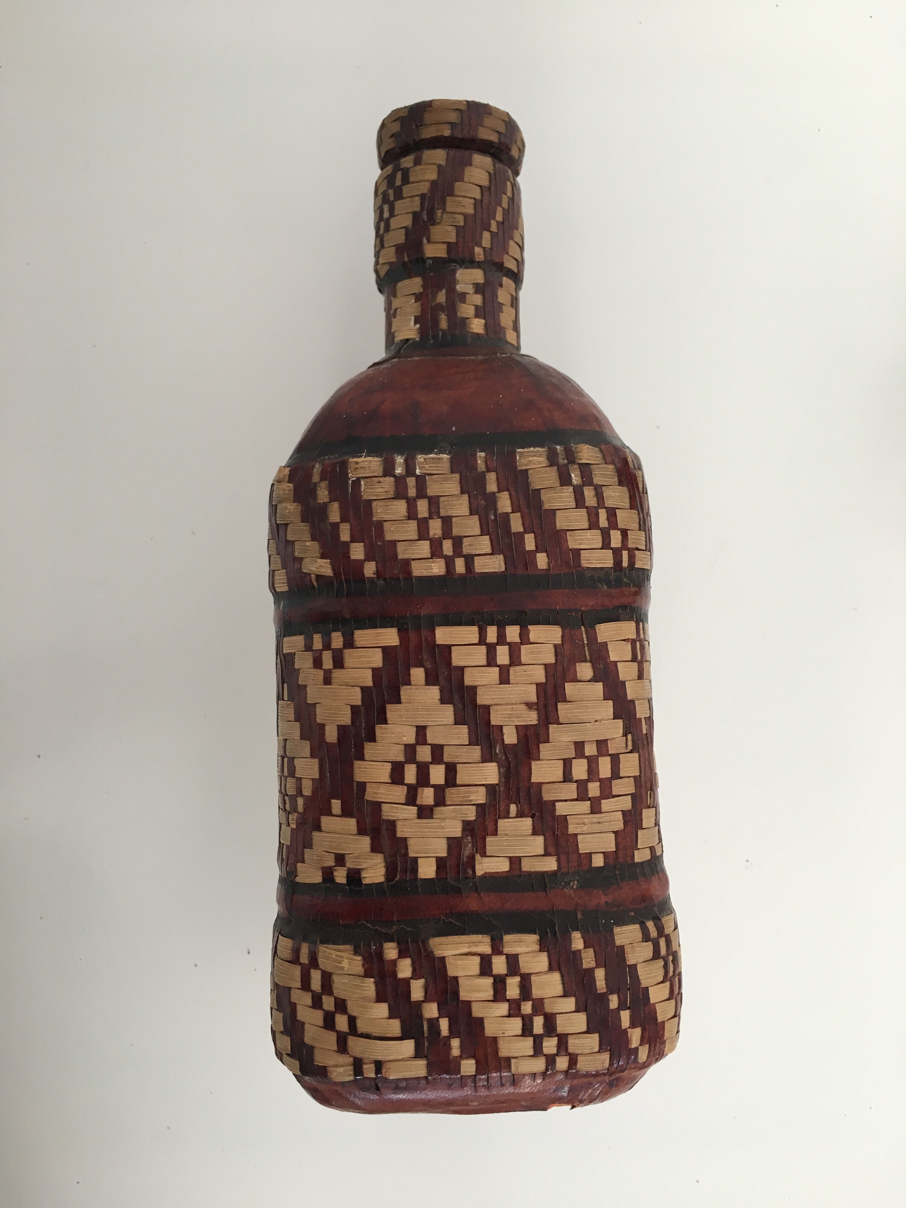 Lot of 2 ethnic leather-wrapped bottles and box