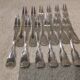 12 silver-plated metal snail forks by silversmith Noel Collet, shell design
