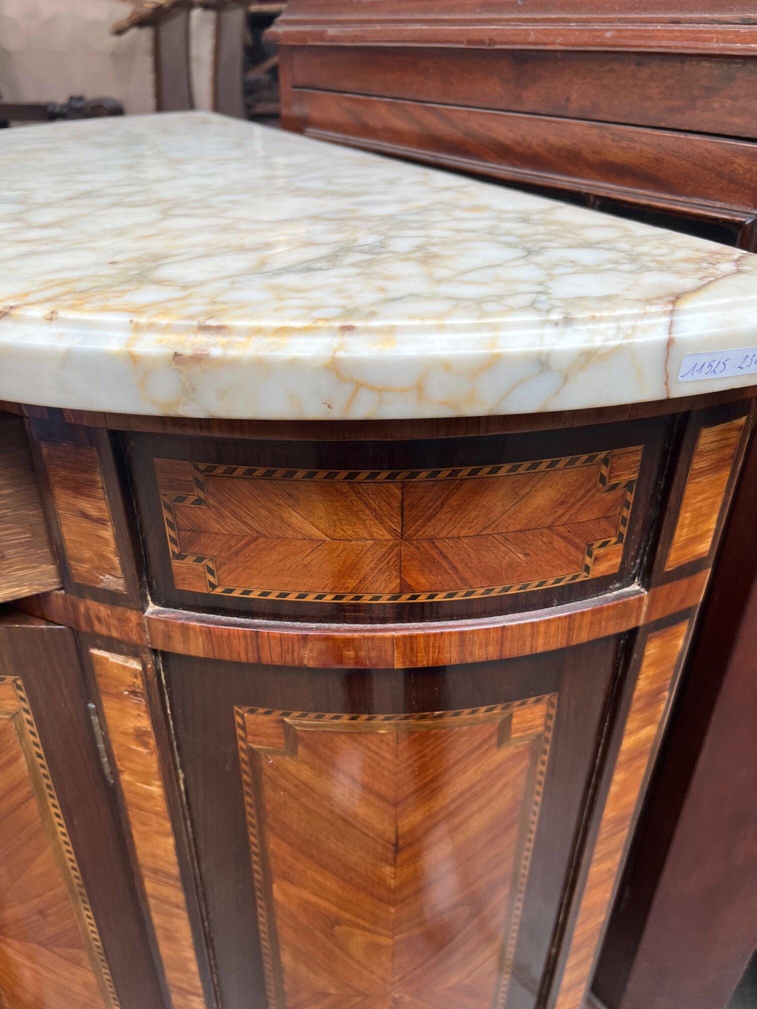 Louis XVI style chest of drawers with marquetry and marble top.