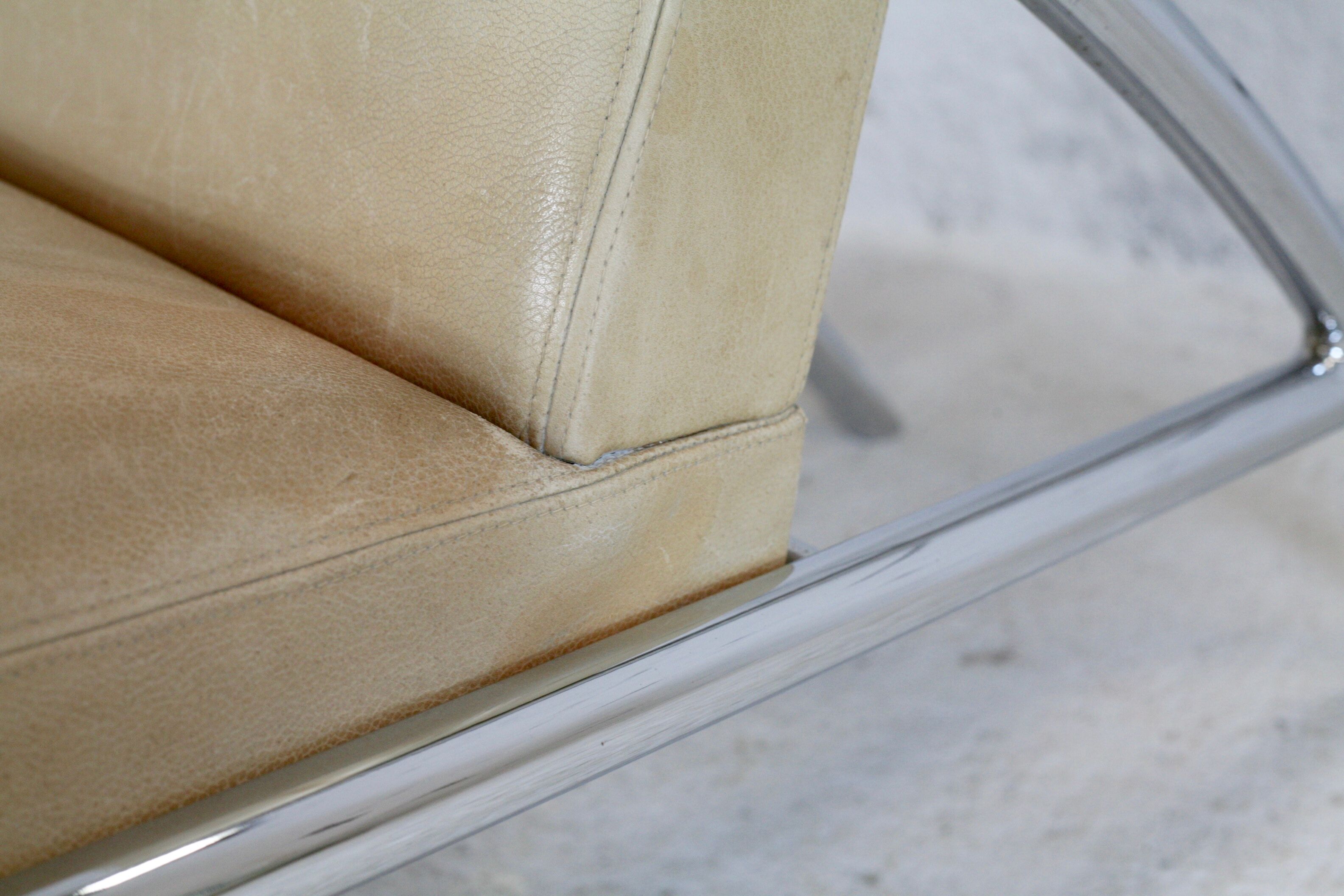 Tubular steel armchair and "cream" leather, France, circa 1970