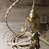 Amber tulip glass portable lamp, golden braided cord.