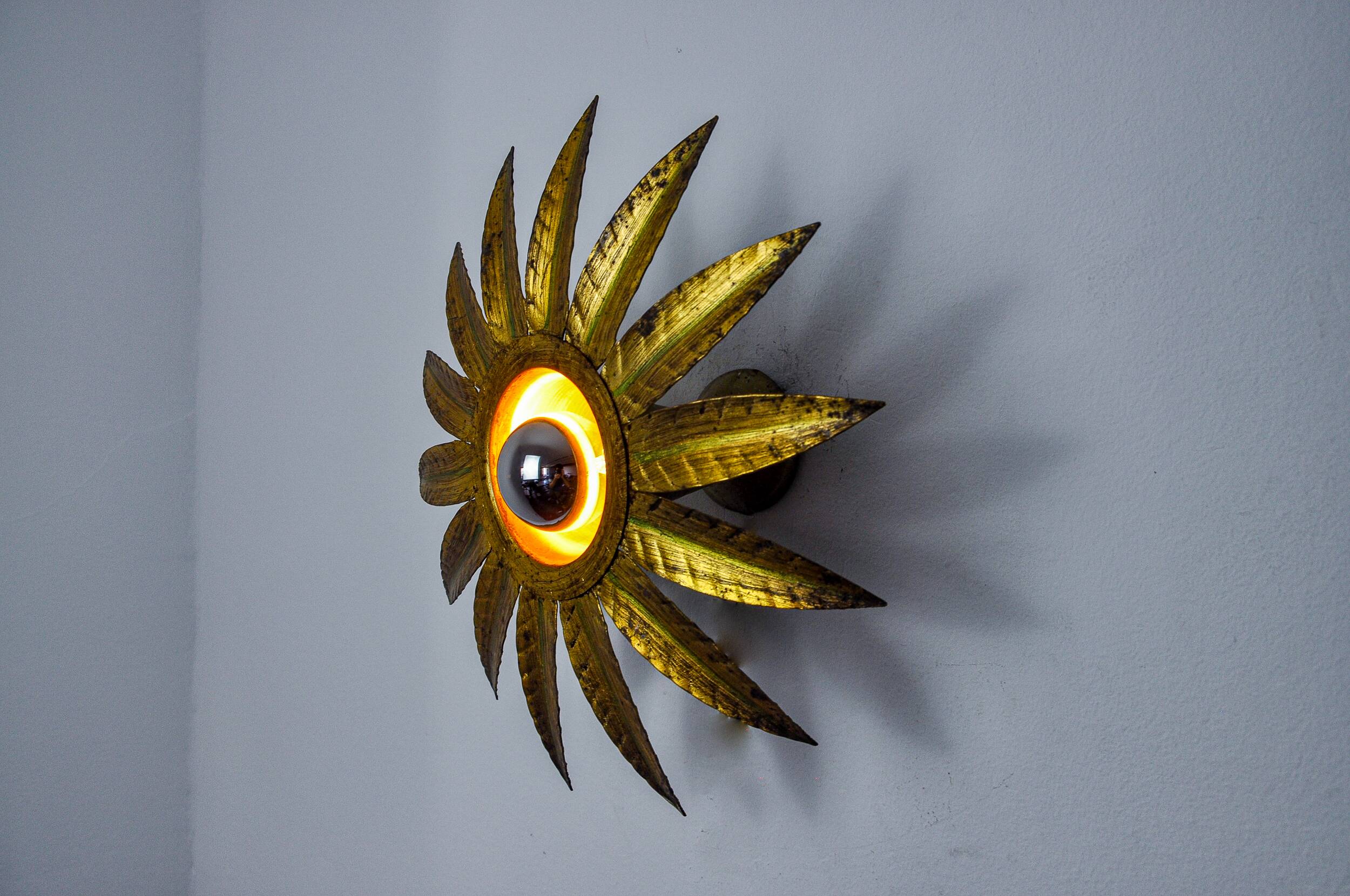 Sun wall lamp by ferro arte, metal and gold leaf, Spain, 1960