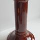 Pair of English brown ceramic candlesticks. Circa 2003, designed by S.