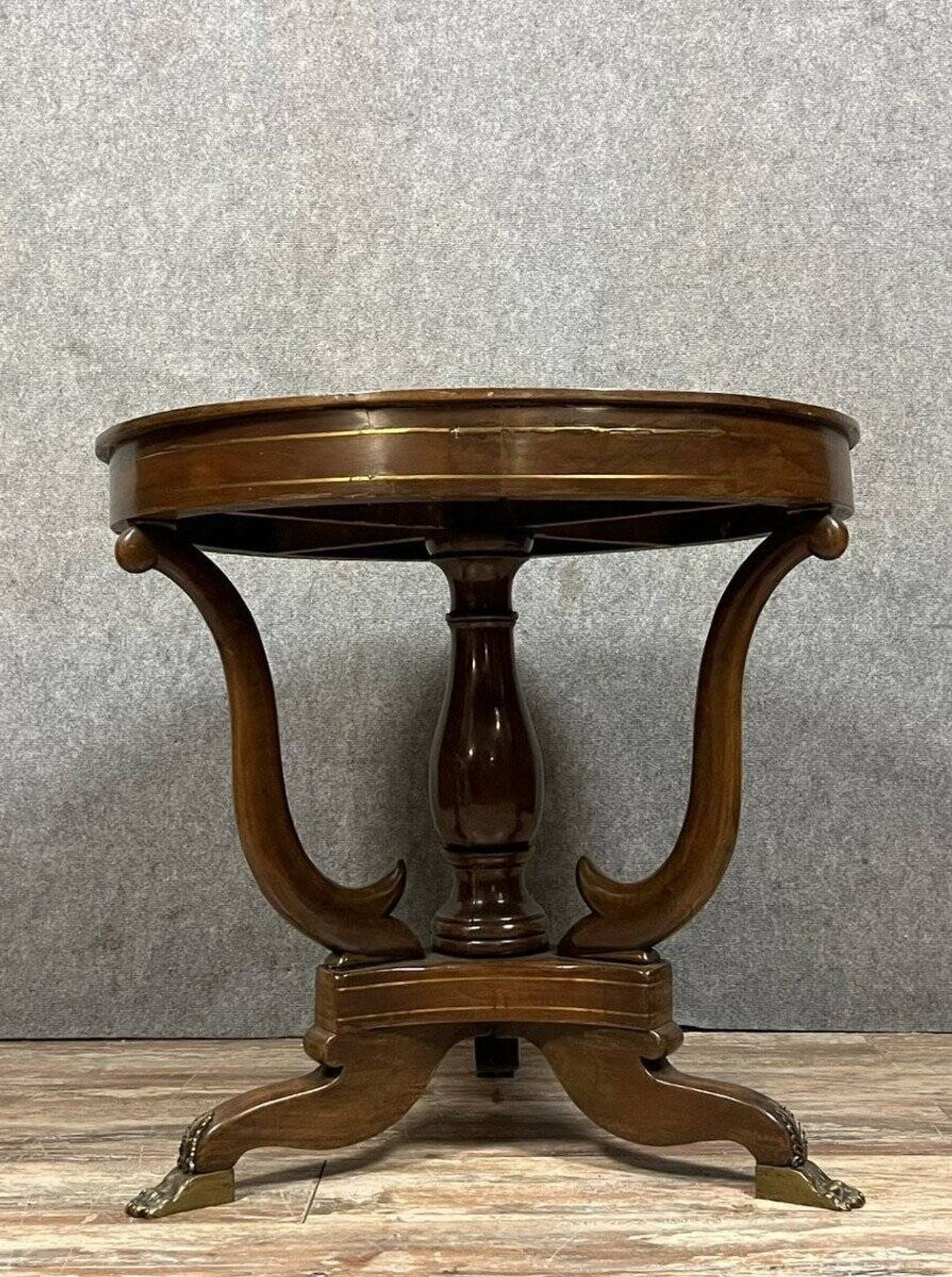 Empire round table – mahogany with inlays and claw feet