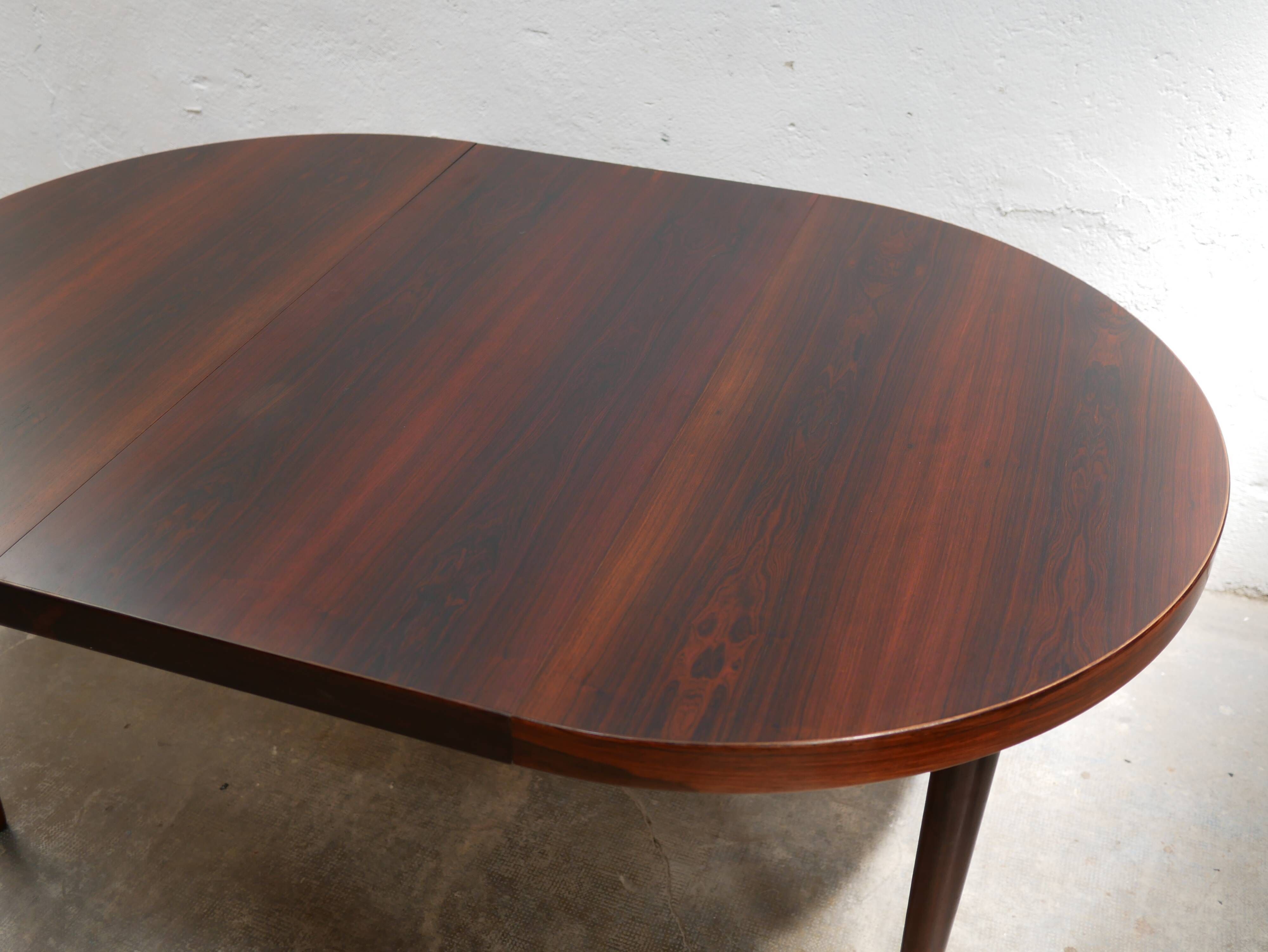 Vintage rosewood extendable Scandinavian round table by Kai Kristiansen for Skovmand and Anders