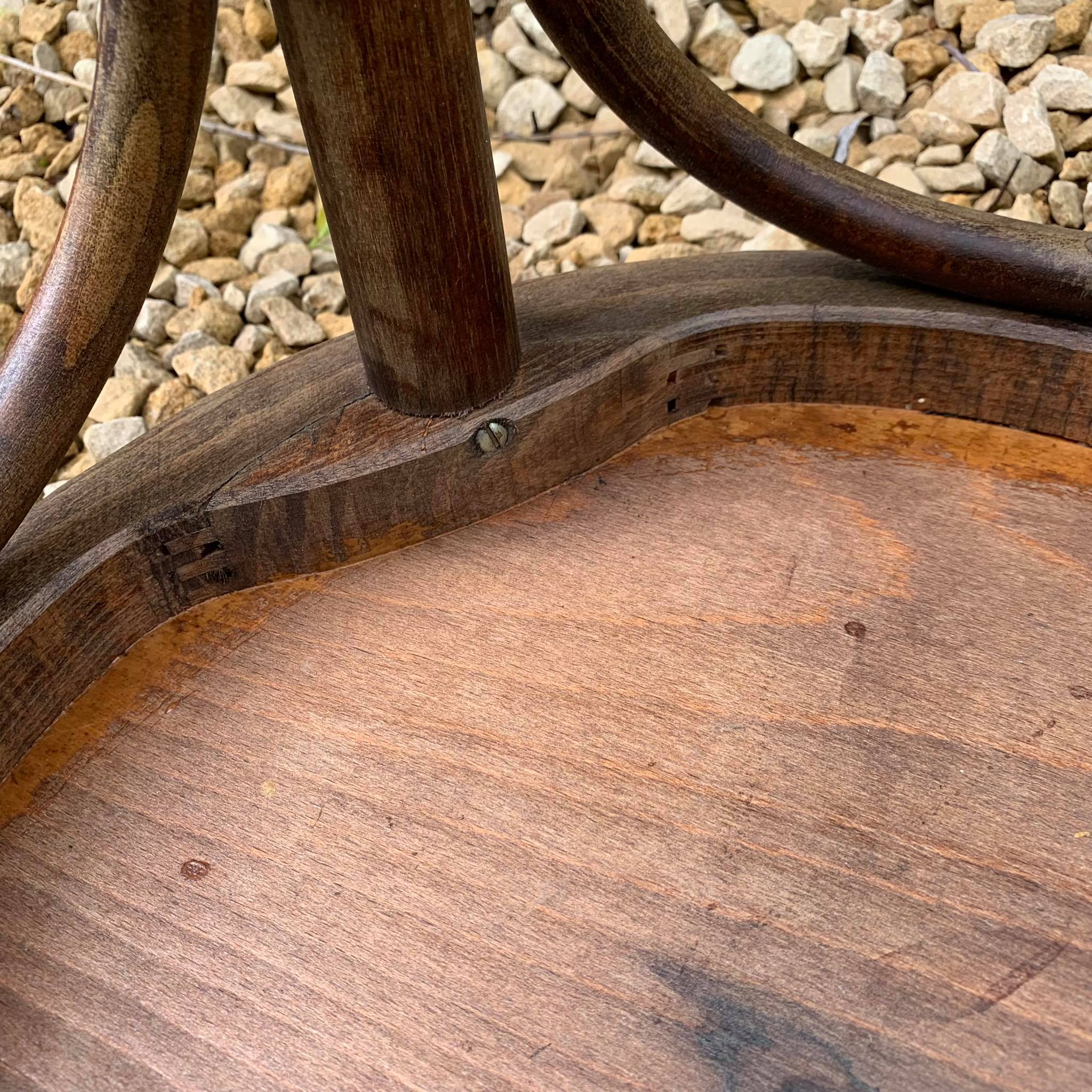 Curved wooden bistro stool