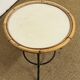 Round rattan side table